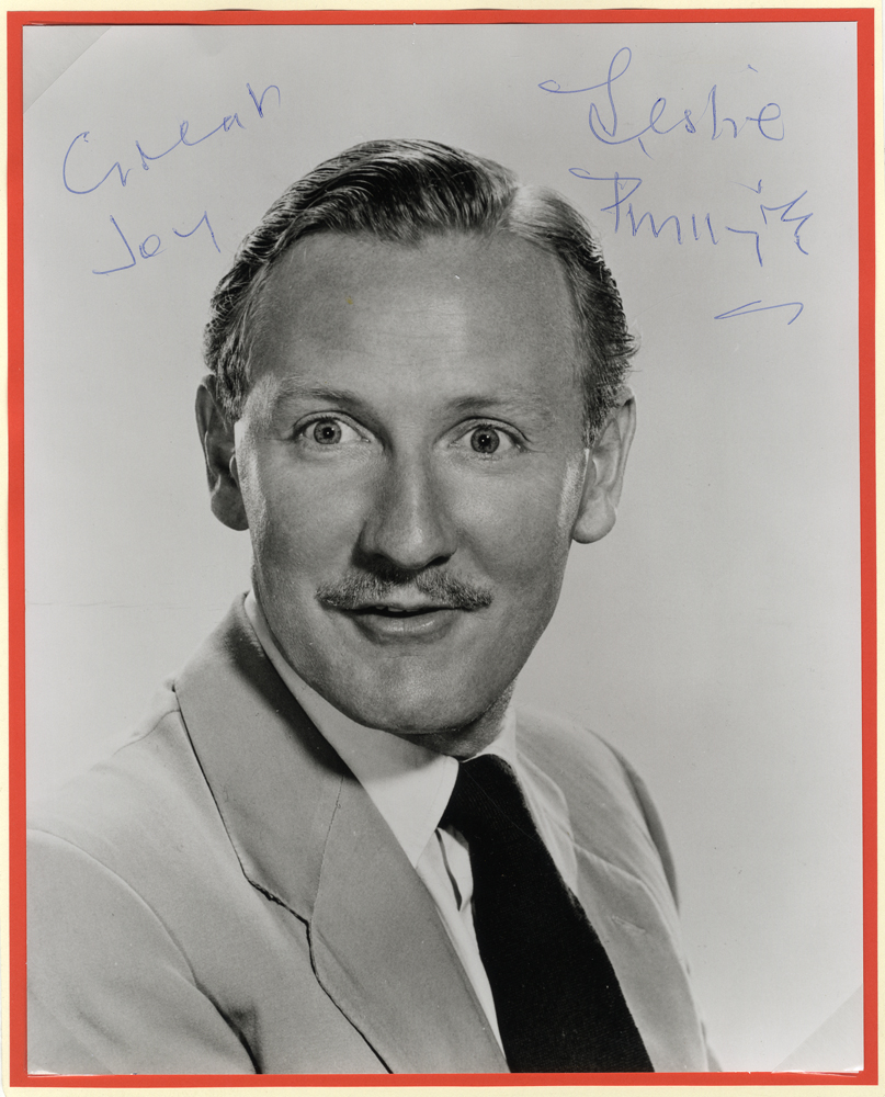PHILLIPS, LESLIE (English actor) black & white photograph signed 'Leslie Phillips'