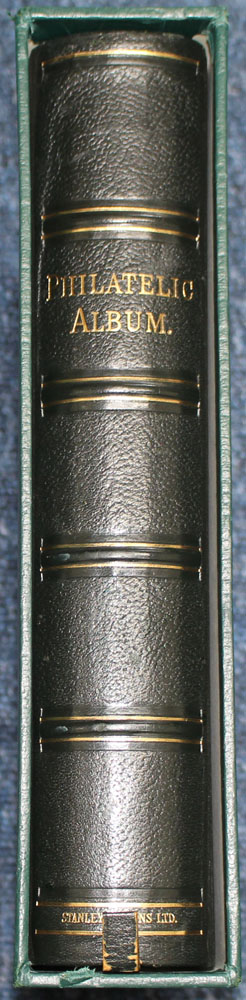 The Stanley Gibbons Philatelic Album with slip case containing 40 linen hinged leaves